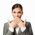 businesswoman covering mouth