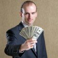 businessman offering money
