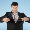 Businessman Stretching Rubber Band