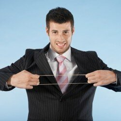 Businessman Stretching Rubber Band
